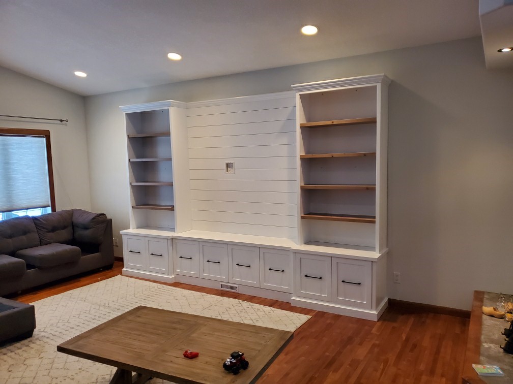 white room with large cabinet
